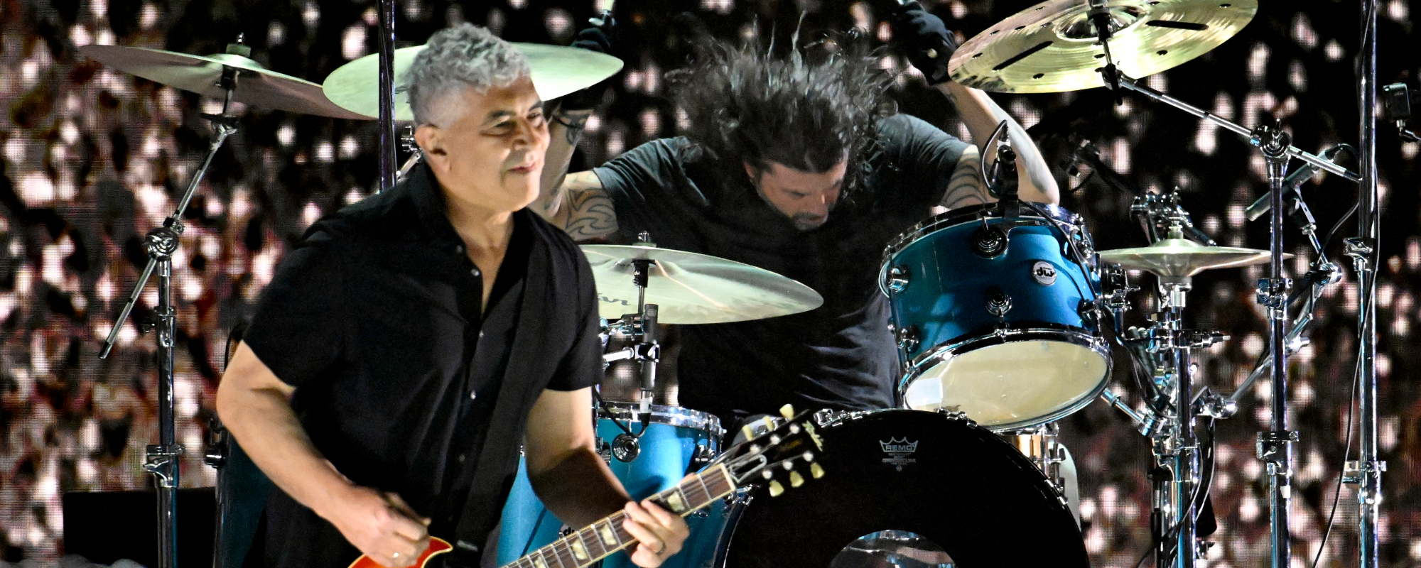 Foo Fighters’ Guitarist To Miss Tour Dates After “Bizarre Gardening Accident”