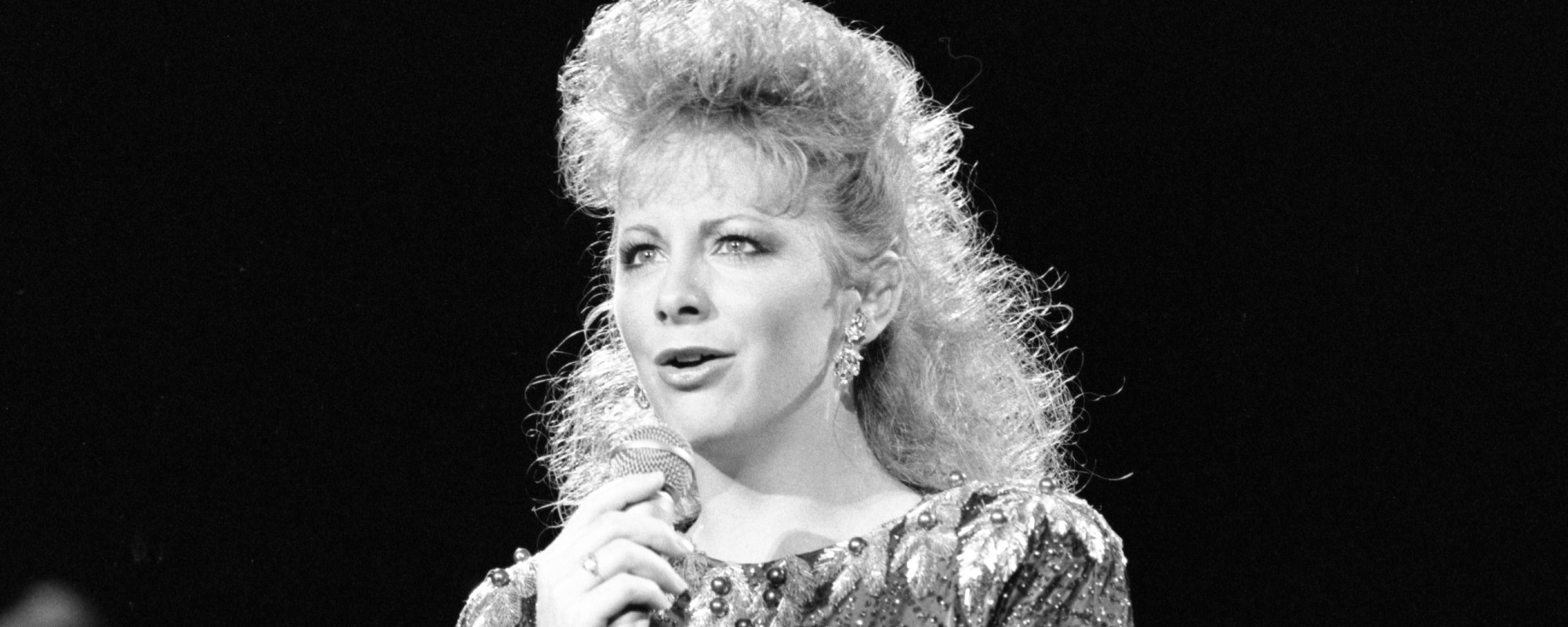 On This Day in 1990, This Country Music Queen Made the Leap to the Big Screen, Starring in a Cult Classic Horror Flick Alongside Kevin Bacon