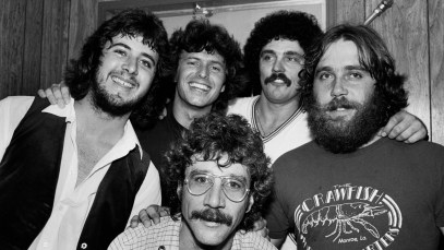 Portrait of members of the American Country and Rock group Pure Prairie League as they pose backstage at ChicagoFest, Chicago, Illinois, August 14, 1980. Pictured are, rear from left, Vince Gill, Steven Patrick Bolin, Michael Reilly, and Michael Connor (1949 - 2004); and, fore, Billy Hinds. (Photo by Paul Natkin/Getty Images)