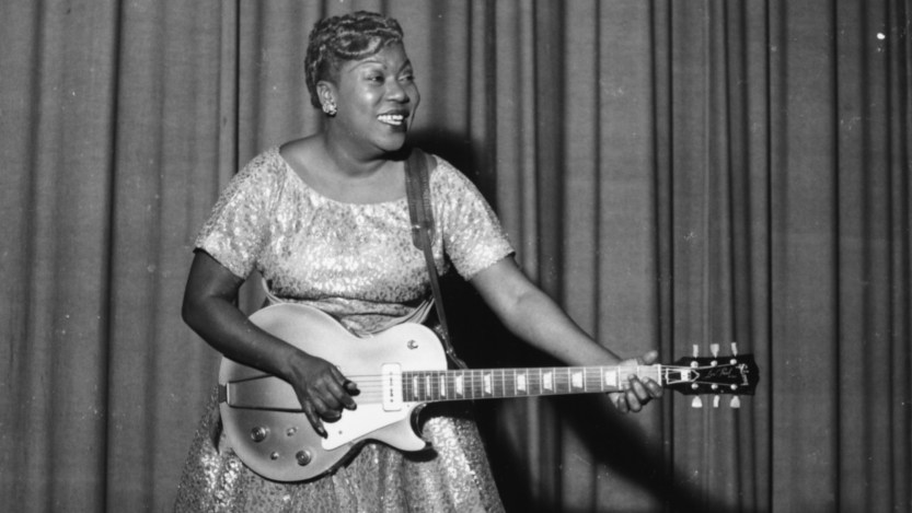 American gospel singer and guitarist Sister Rosetta Tharpe (1915 - 1973) playing a Gibson Les Paul electric guitar on stage with Chris Barber's Jazz Band, Cardiff, Wales, November 1957. (Photo by Chris Ware/Keystone Features/Hulton Archive/Getty Images)