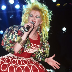 (MANDATORY CREDIT Ebet Roberts/Getty Images) Cyndi Lauper performing at a WNEW Christmas Concert at Madison Square Garden in New York City on December 19, 1986. (Photo by Ebet Roberts/Redferns)